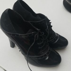 Black oxford style high heels lace up